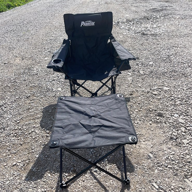 Collapsible camping chair. Black. Comes with foot stool and storage bag!