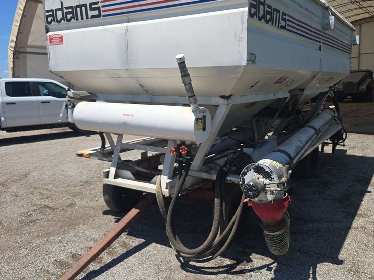 12-ton-adams-fertilizer-tender-on-running-gear,-used-last-fall,-hyd.-drive-controls,-2-compartments,-roll-tarp-image-1