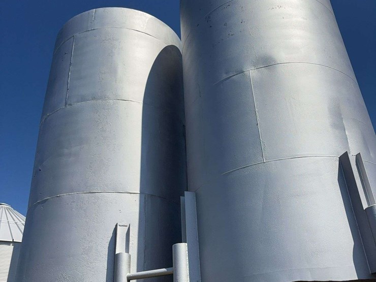 2-large-steel-fertilizer-or-storage-tanks,-holds-40-50-ton-a-piece,-around-100-ton-between-both,-welded-as-one-unit,-buyer-is-responsible-for-removing-and-loading-image-2