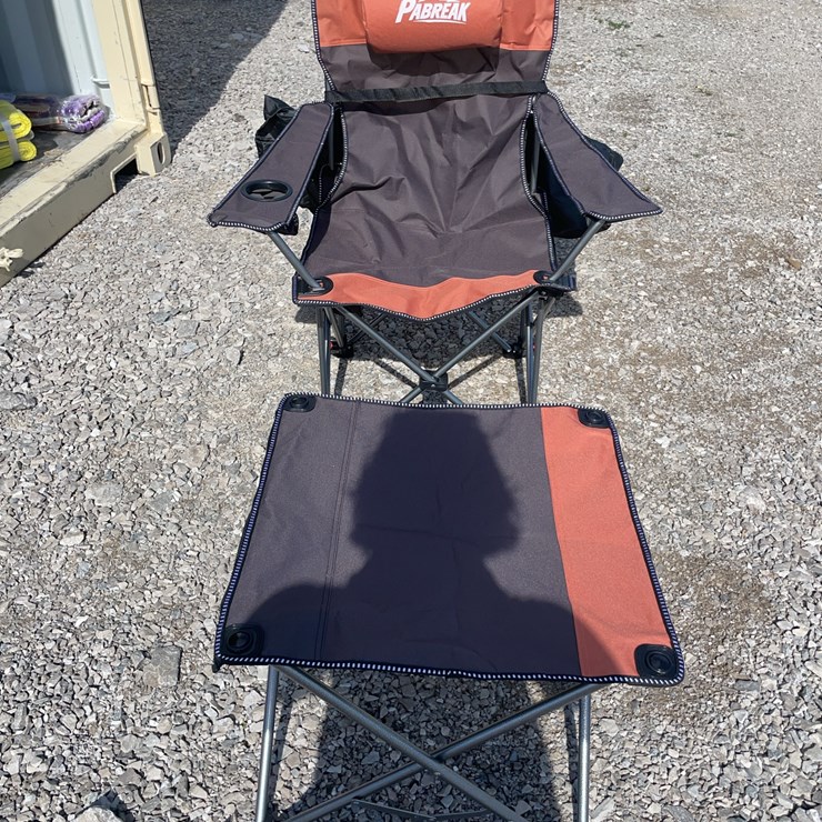 Collapsible camping chair. Orange-brown. Comes with foot stool and storage bag!