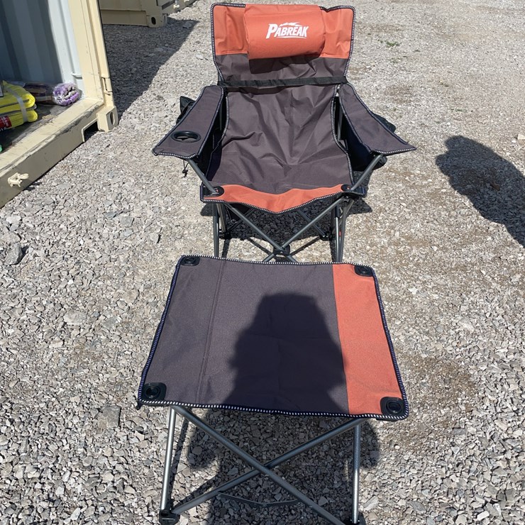 Collapsible camping chair. Orange-brown. Comes with foot stool and storage bag!