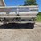 12-ton-adams-fertilizer-tender-on-running-gear,-used-last-fall,-hyd.-drive-controls,-2-compartments,-roll-tarp-image-4