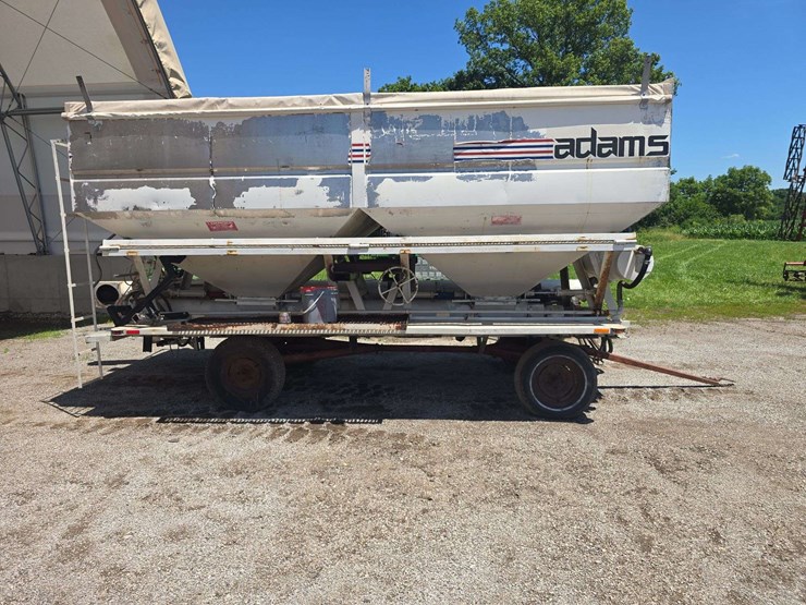 12-ton-adams-fertilizer-tender-on-running-gear,-used-last-fall,-hyd.-drive-controls,-2-compartments,-roll-tarp-image-4