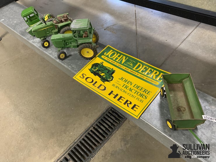 john-deere-toy-tractors-and-sign-image-1