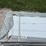 bundle-of-white-metal-roofing-panels-image-2