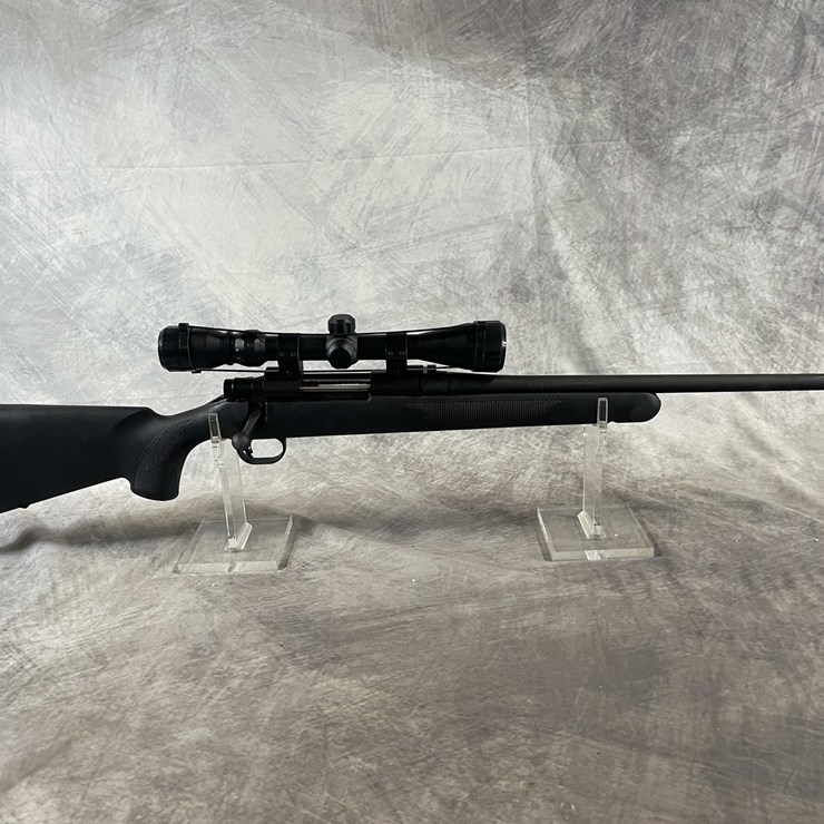 #1297 • Mossberg 100 ATR , .243 Cal Bolt Action Rifle, SN: BA163306, (Neenah, WI)