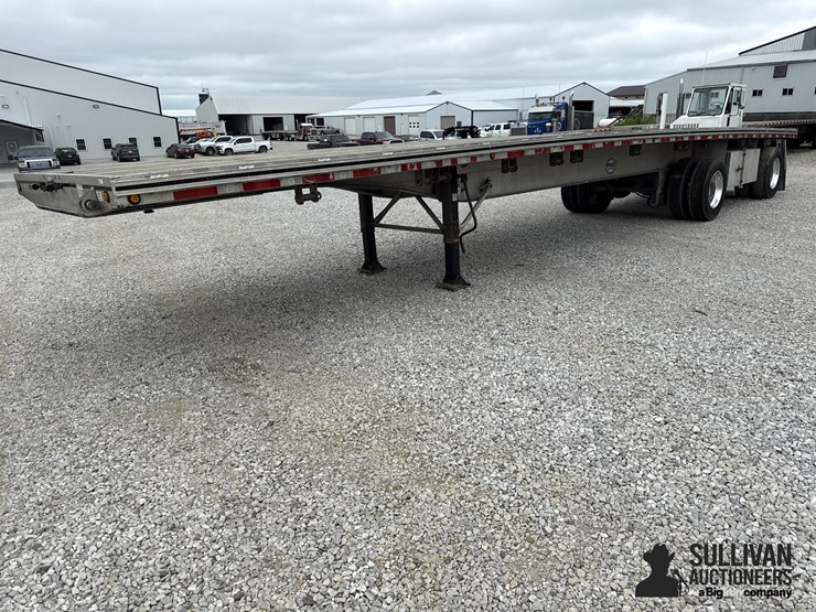2015-mac-45’-t/a-flatbed-trailer-w/piggyback-forklift-mounts-image-1