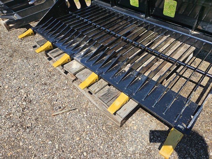 #325-•-2025-wolverine-68"-skid-steer-rock-bucket-image-9