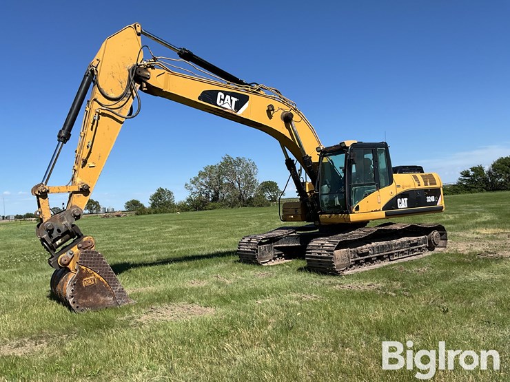 2007-caterpillar-324dl-image-1