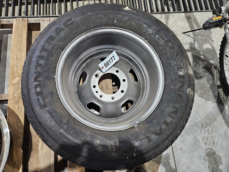 #177-•-lt275/65r18-tire-with-8-bolt-rim-image-1