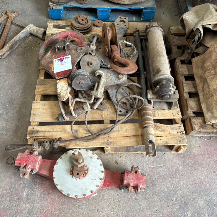 (4 pallets) assorted flanges, snatch blocks, we’ll head parts, flood lights, etc
