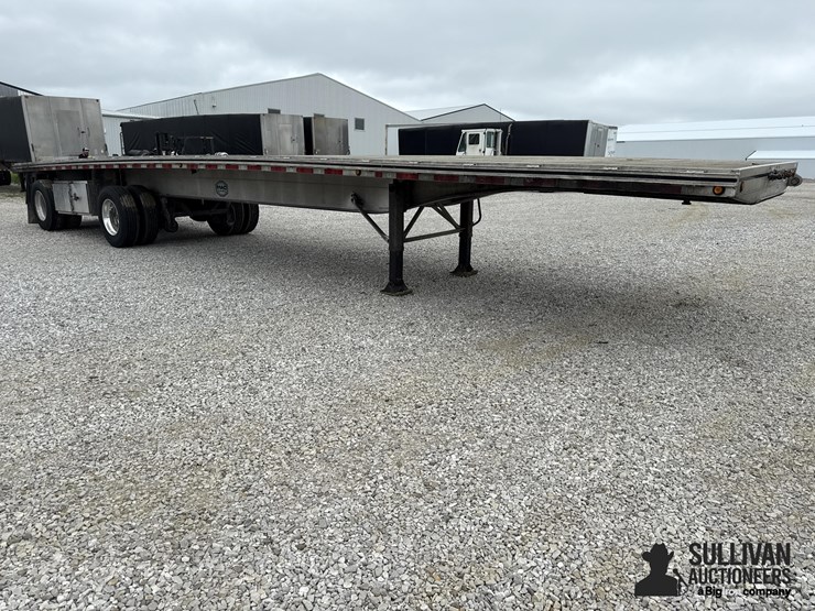 2015-mac-45’-t/a-flatbed-trailer-w/piggyback-forklift-mounts-image-3