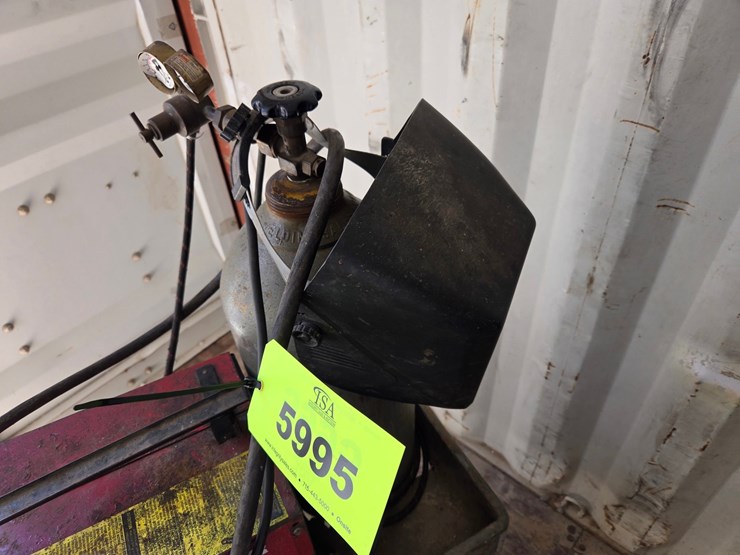 #5995-•-century-130-mig-welder-w/tank,-cart,-makita-saw,-and-blades-image-15