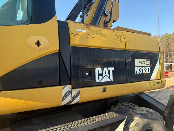 #1298-•-caterpillar-m318d-material-handler-image-42
