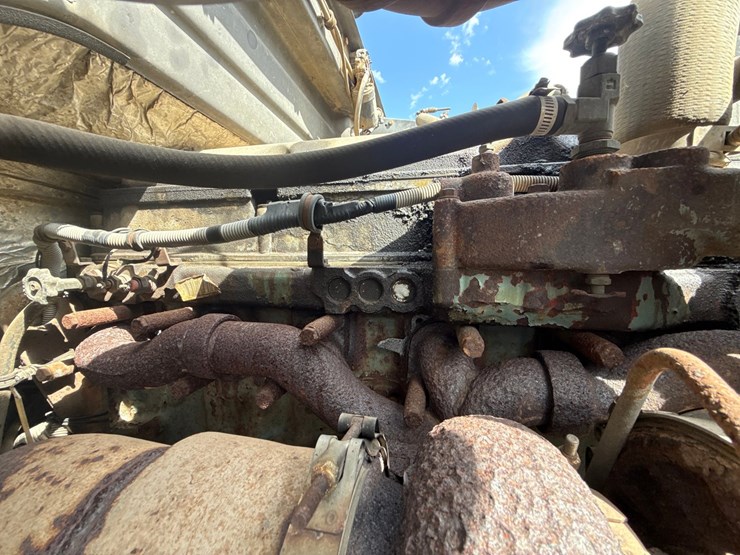 #60835-•-1991-volvo-/-gm-white-tandem-axle-storm-truck-image-25