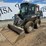 2015-deere-320e-image-1