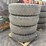 #1326-•-bridgestone-tires-with-rims-image-1