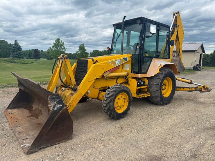 #1184-•-1997-kobelco-750-4x4-loader-backhoe-image-1