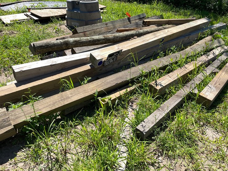 #7129-•-pile-of-used-wooden-posts-image-5