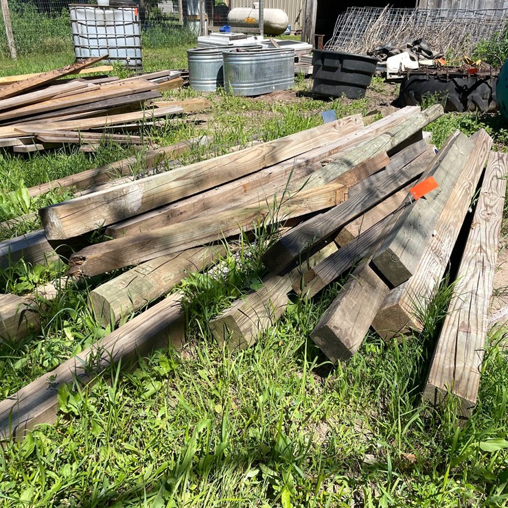 #7129 • Pile of Used Wooden Posts