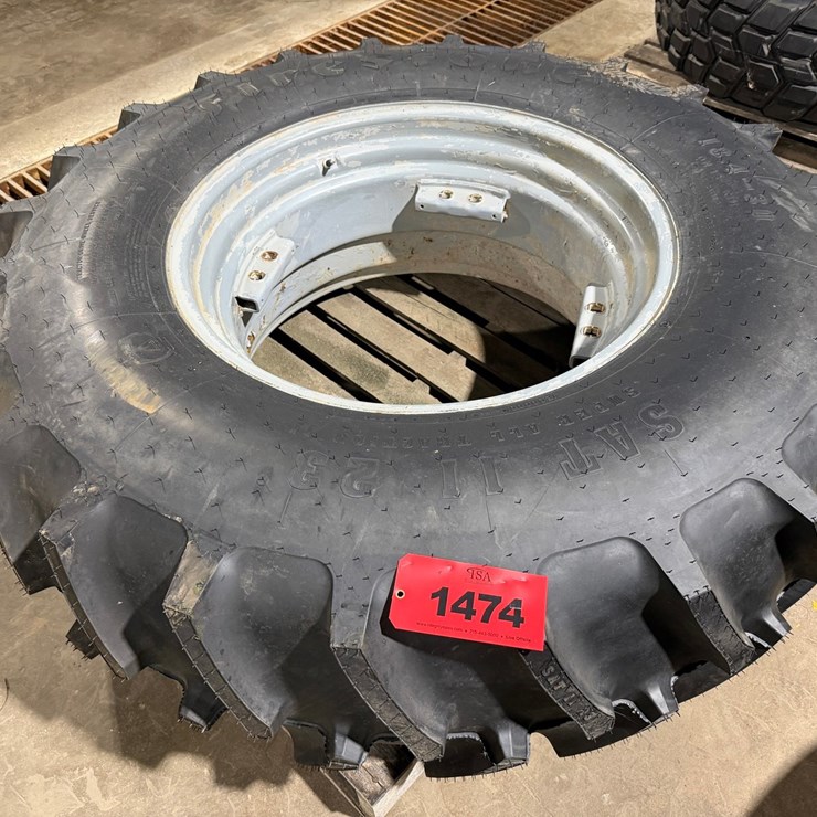 #1474 • Unused 18.4-30 Tractor Tire on 16" Massey Ferguson Wheel