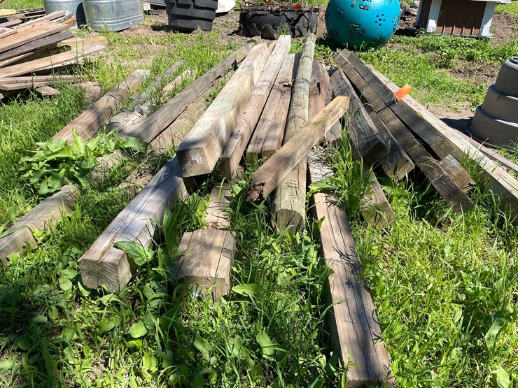 #7129-•-pile-of-used-wooden-posts-image-2