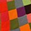 hand-knitted-multi-colored-patchwork-blanket-image-2