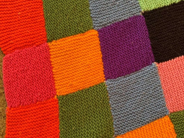 hand-knitted-multi-colored-patchwork-blanket-image-2