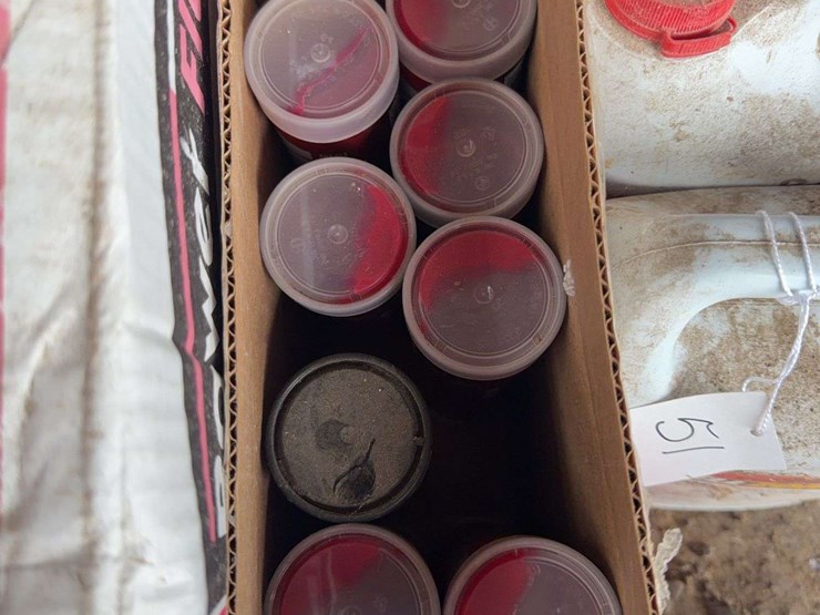 assorted-automotive-and-agricultural-lubricants,-fluids,-and-grease-cartridges-image-8