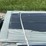 stack-of-black-corrugated-metal-roofing-panels-image-2