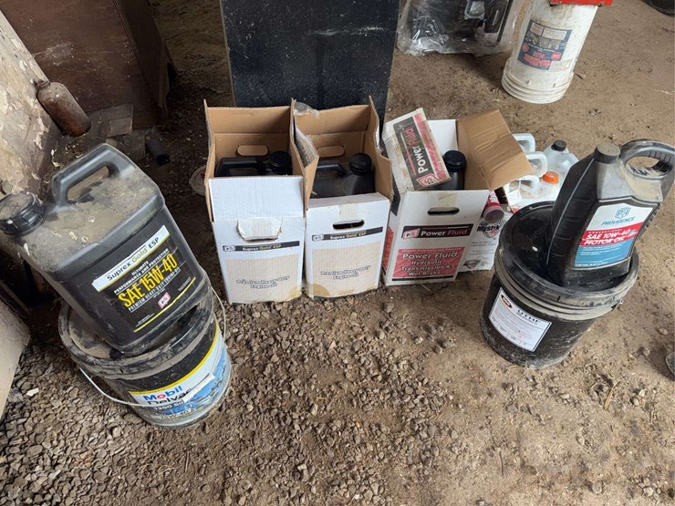 assorted-automotive-and-agricultural-lubricants,-fluids,-and-grease-cartridges-image-1