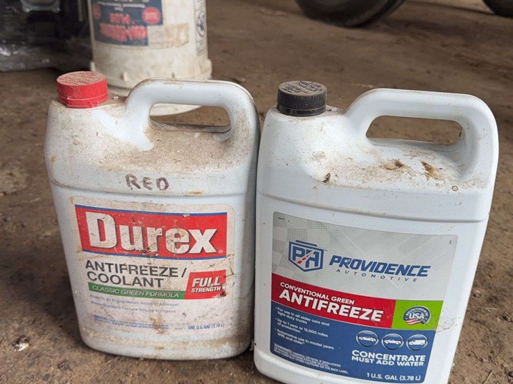 assorted-automotive-and-agricultural-lubricants,-fluids,-and-grease-cartridges-image-11
