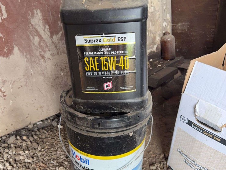 assorted-automotive-and-agricultural-lubricants,-fluids,-and-grease-cartridges-image-12