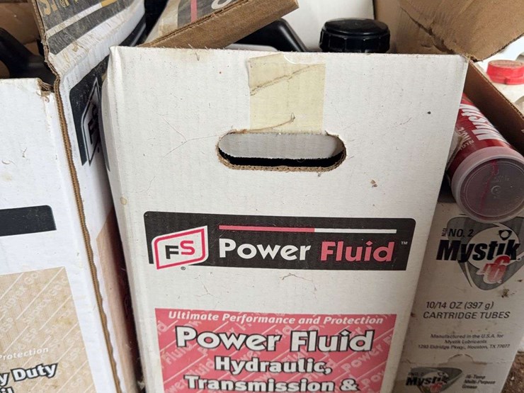 assorted-automotive-and-agricultural-lubricants,-fluids,-and-grease-cartridges-image-4