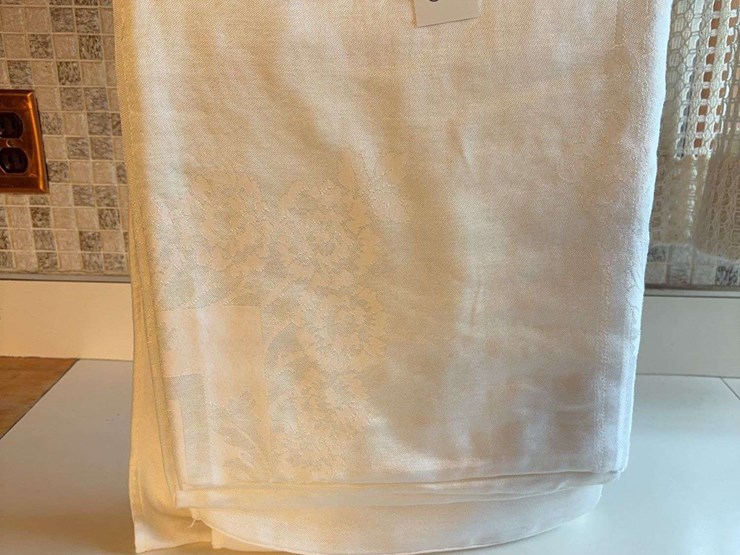 white-damask-tablecloth-with-floral-pattern-image-1