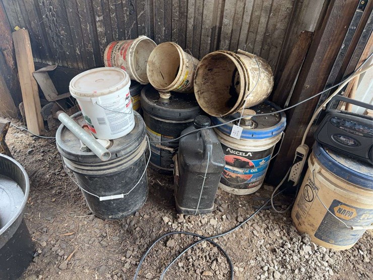 collection-of-assorted-lubricant-buckets-and-o's-gold-thermometer-image-3