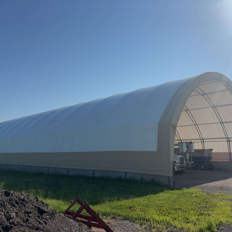 Norseman Structure 72 ft. x 144 ft. hoop building/Coverall barn on 12 ft. centers with a 27 ft. 4 in. peak height. Buyer is responsible for disassembly and removal. The tarp is 7–8 years old and remains in very good condition. Tarp and framework are included. A new tarp and framework are estimated a