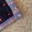 hand-tied-patchwork-quilt-with-multi-colored-fabric-blocks-image-5
