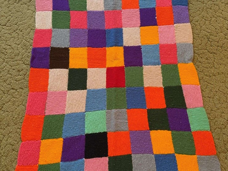 hand-knitted-multi-colored-patchwork-blanket-image-1