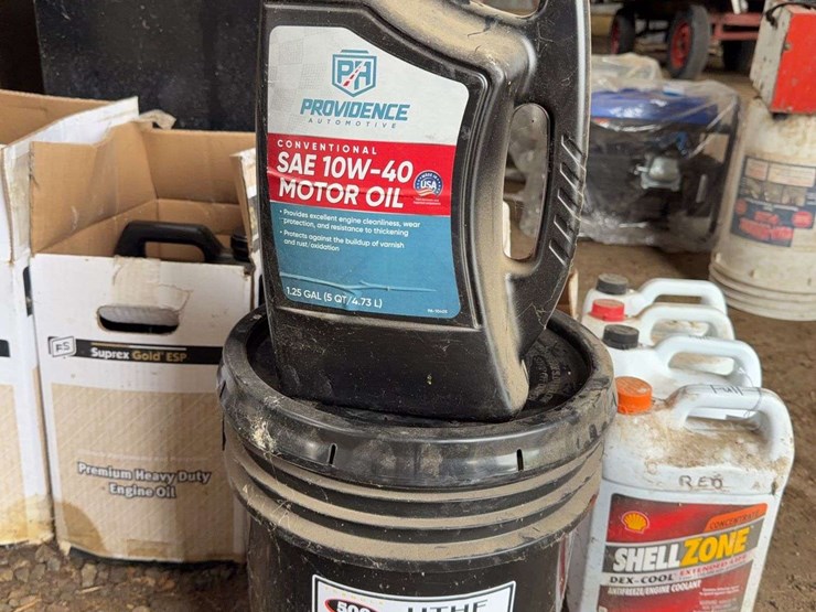 assorted-automotive-and-agricultural-lubricants,-fluids,-and-grease-cartridges-image-13