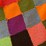 hand-knitted-multi-colored-patchwork-blanket-image-4