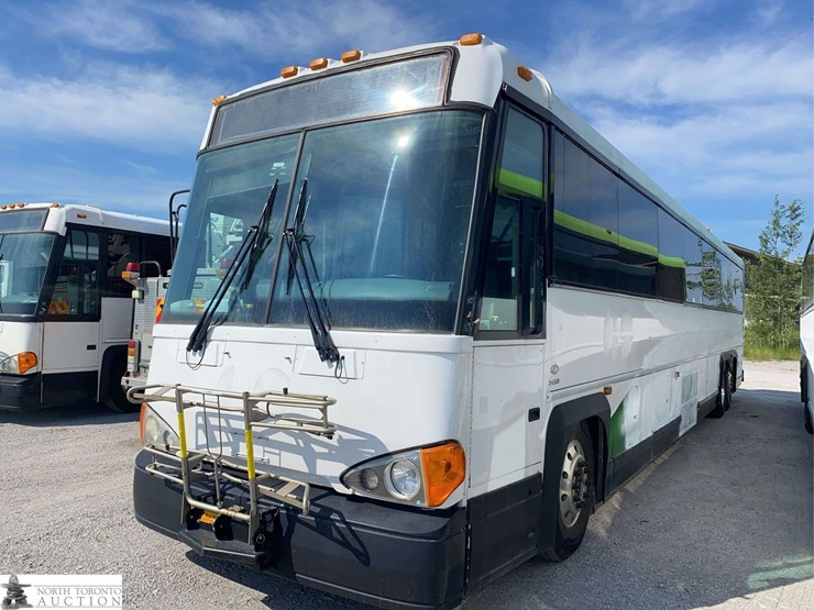 non-operable-2011-motor-coach-industries-d4500-t/a-55-passenger-wheelchair-accessible-bus-image-1