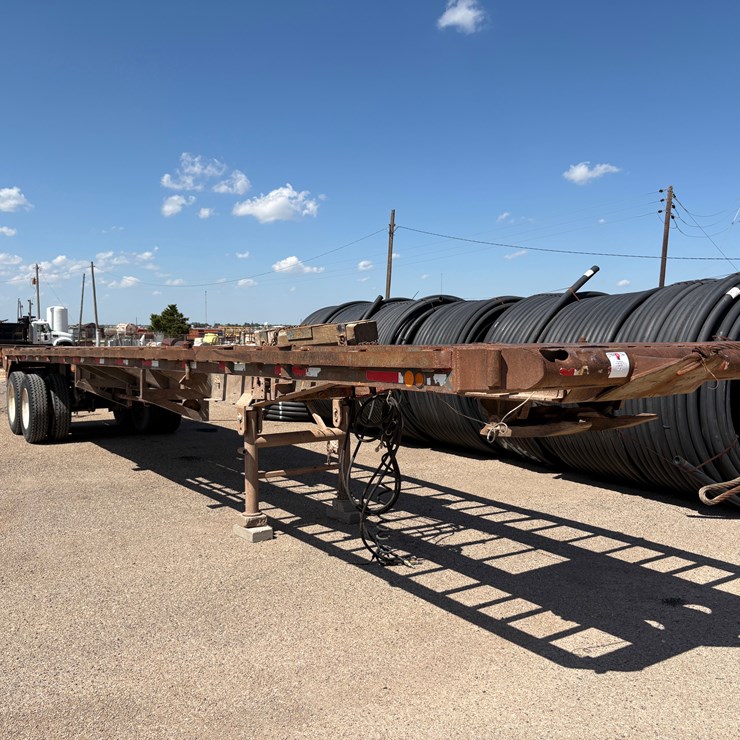 1982 SHOPBUILT 40’ X 8’ T/A FLATBED TRAILER