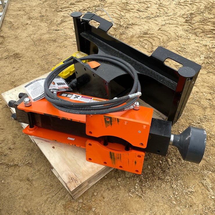 #2054 • New Wolverine Skid Steer Post Hole Driver