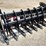 #144-•-skid-steer-curved-log-grabber-image-1