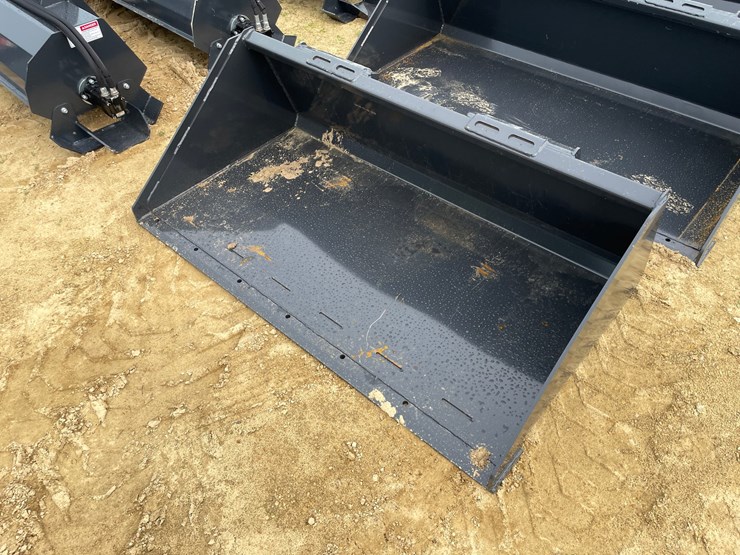 #2028-•-new-wolverine-skid-steer-66"-bucket-image-1