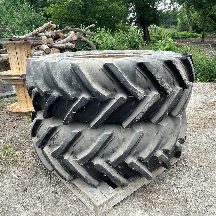 #8328 • (2) 18.4R34 Rear Tractor Tires and Rims