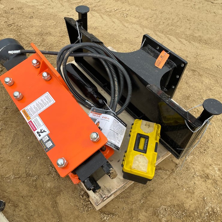 #2053 • New Wolverine Skid Steer Post Hole Driver