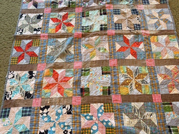 multi-pattern-patchwork-quilt-with-star-motif-image-1