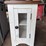 side-table-with-metal-mesh-door-and-dark-wood-top-image-1